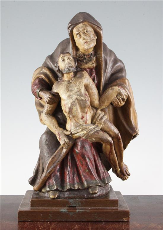 A 19th century Continental carved wood group of the Pietà, 15in.